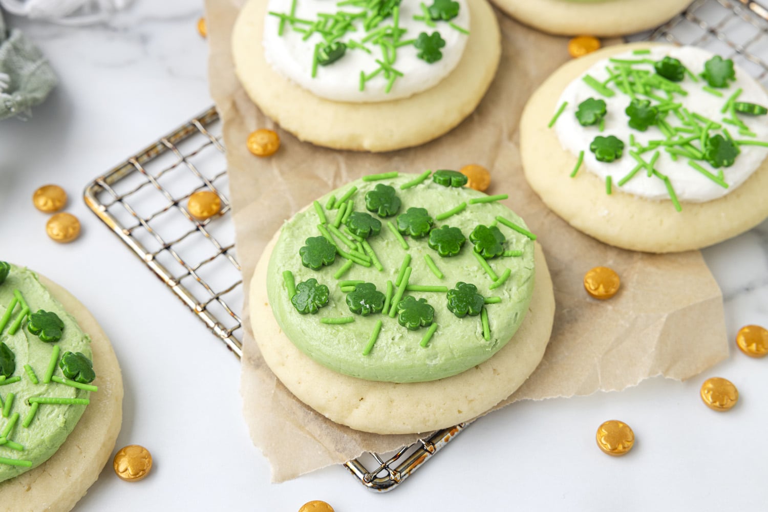 Green St Patrick's Day sugar cookies on rack