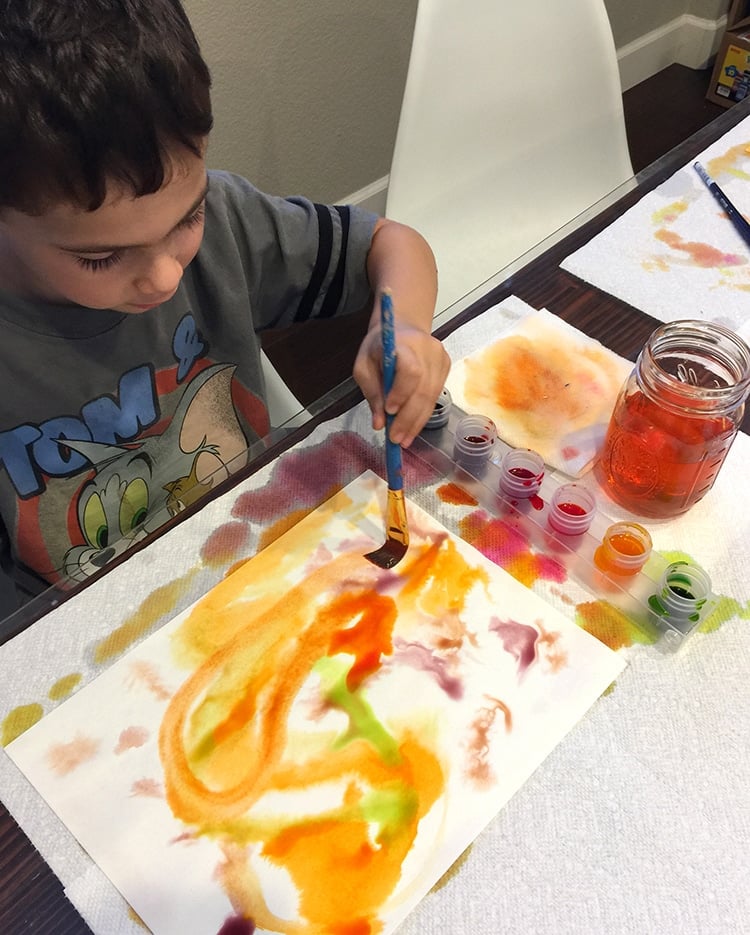 kids painting with water colors