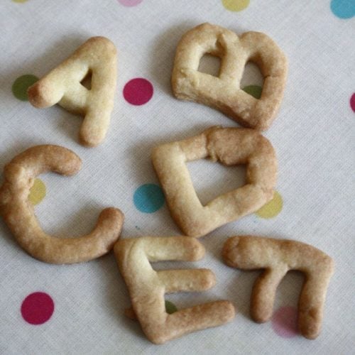 alphabet cookies on table