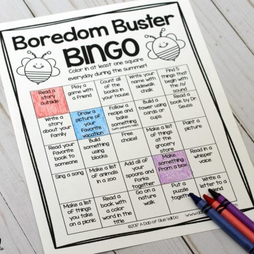 Bordeom Buster bingo on table with a pen
