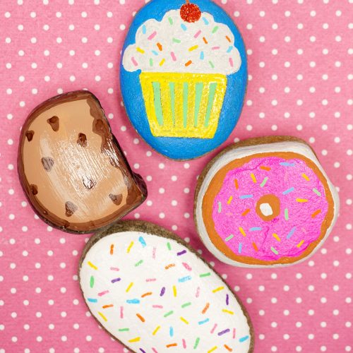 dessert painted rocks on pink background