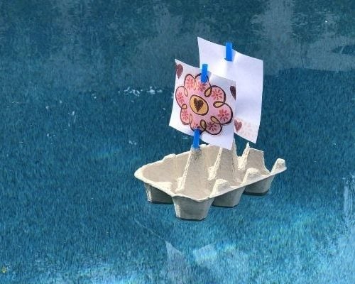 egg carton boat floating in water