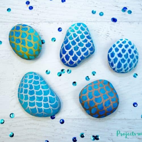 rocks painted to look like mermaid scales
