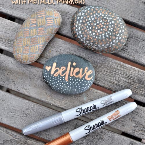 sharpie marker next to rocks painted with sharpies