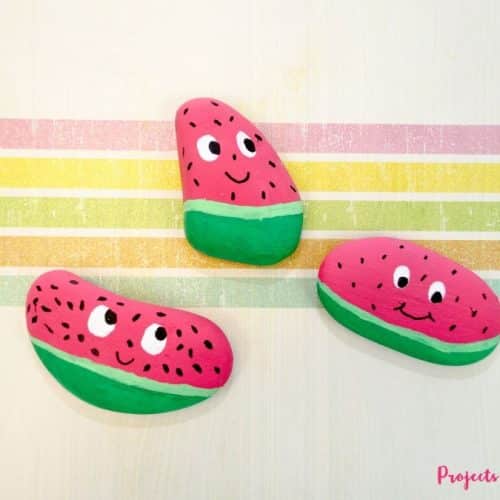 watermelon painted rocks with faces