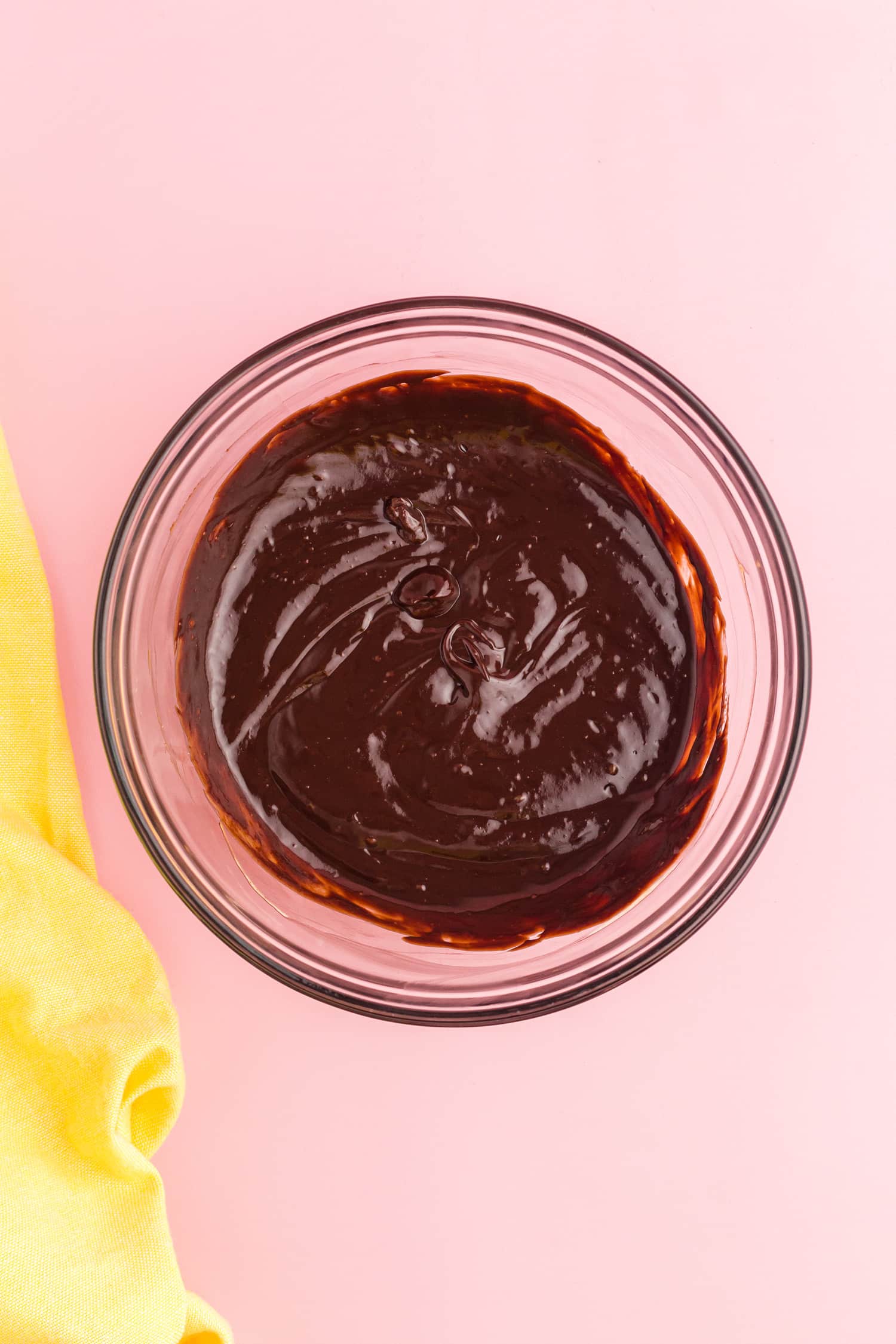 whippe chocolate ganache in a clear mixing bowl