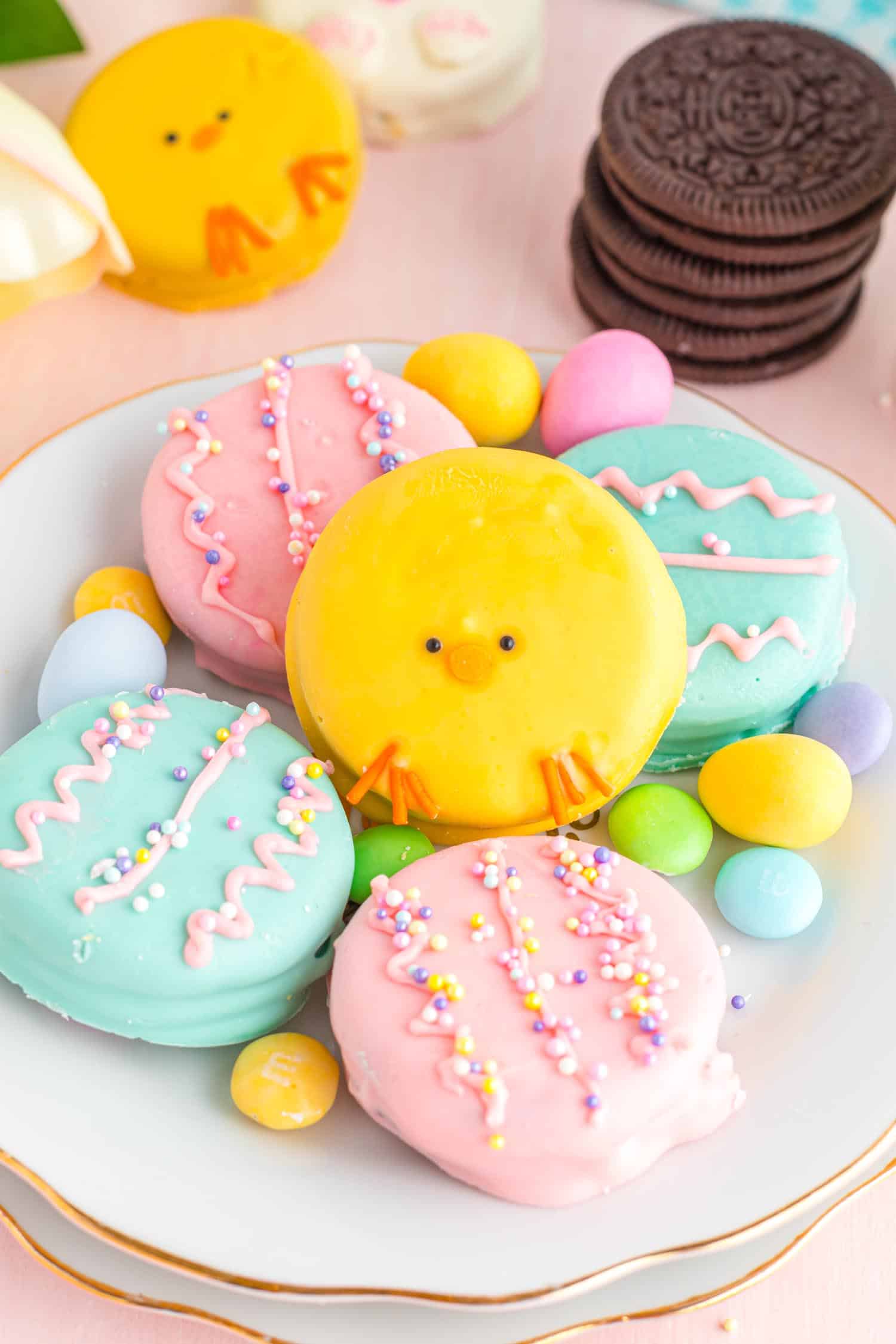 Platter of colorful Easter themed decorated Oreo cookies