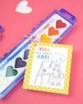 Cute "You are a work of art!" paint themed valentine card for Valentine's Day with heart-shaped watercolor paints