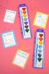 Heart-shaped watercolor paint set with cute printable paint valentine card for kids