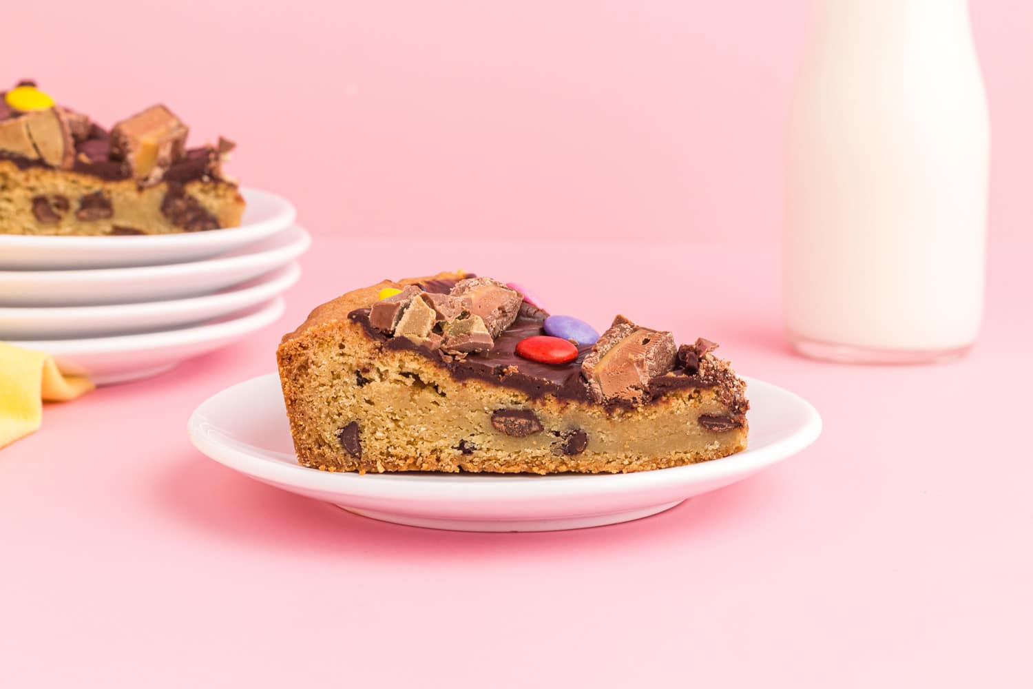 close up of slice of chocolate chip cookie cake