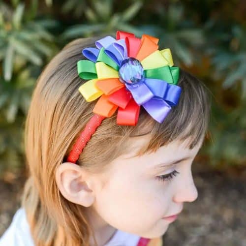 Small child wearing DIY Rainbow headband