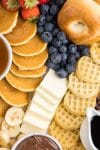 Close up of various foods placed on breakfast party tray