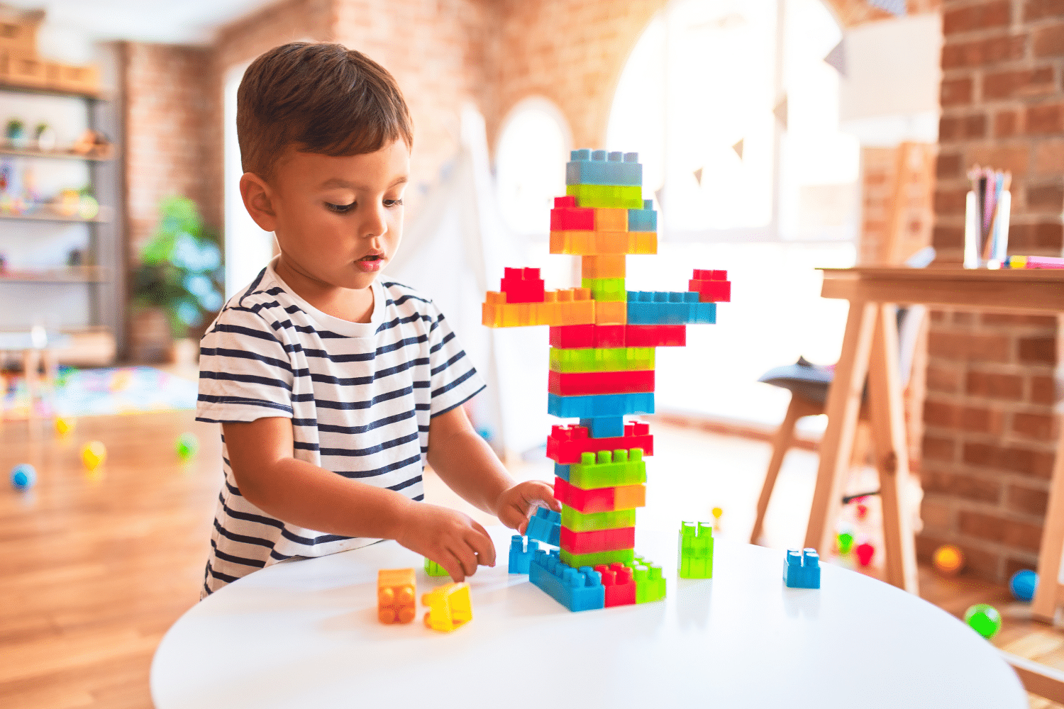 Child building block tower