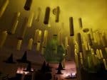 Looking up at a bunch of hanging Harry Potter floating candles on the ceiling