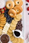 Easy to make charcuterie board on white background