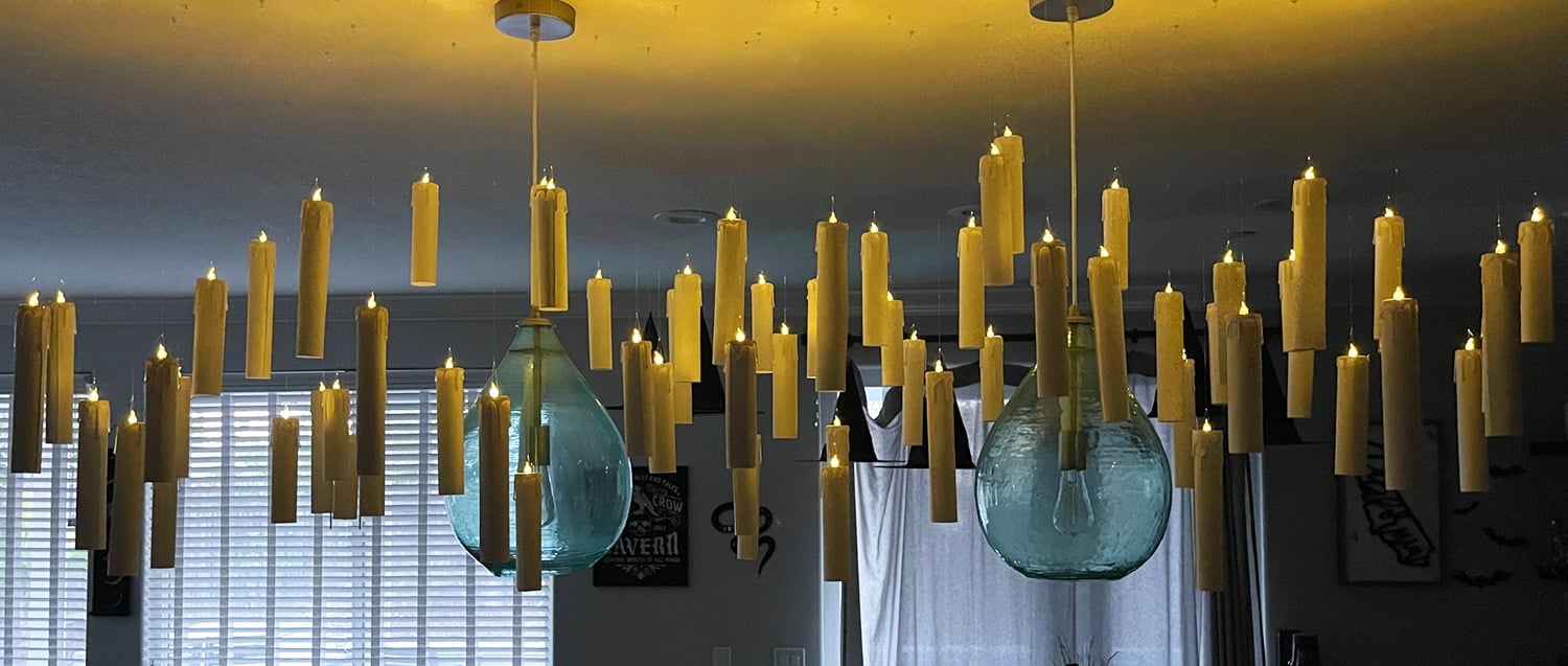 Row of Harry Potter floating candles hanging from the ceiling