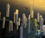 Cluster of many Harry Potter floating candles hanging from the ceiling