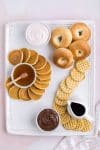 Pancakes, waffles, and bagels added to yummy breakfast board