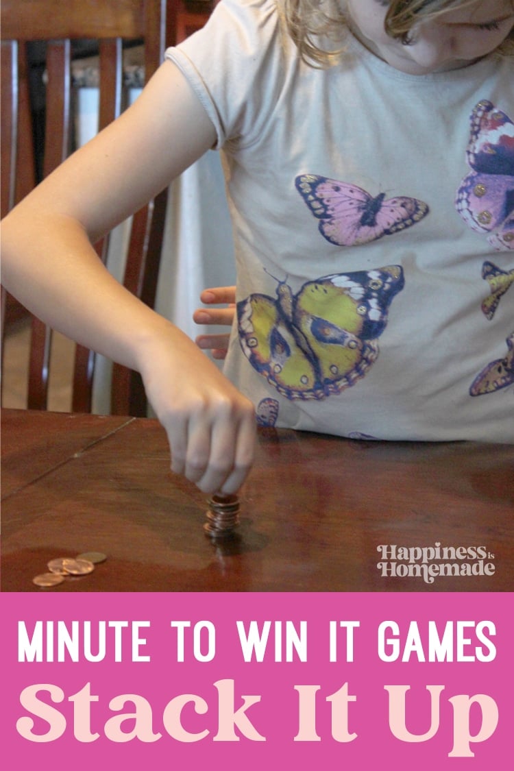 "Minute to Win It Games: Stack It Up" text with image showing a girl's hand stacking up a pile of pennies