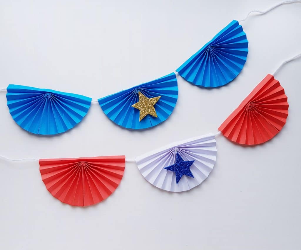 Red white and blue paper banner kids craft on white background