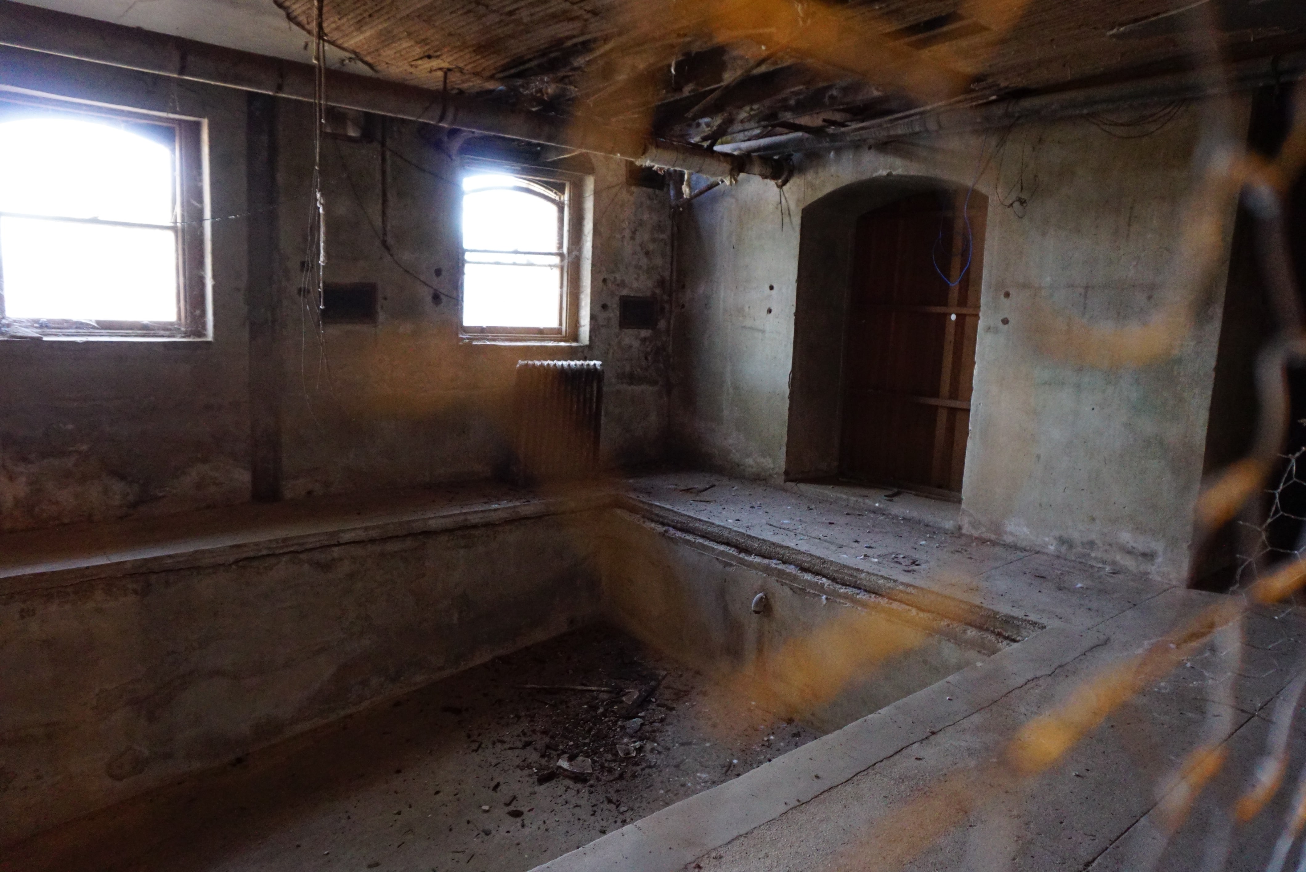 empty and abandoned "plunge pool" in Preston Castle basement