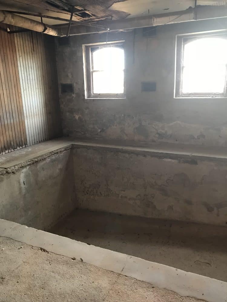 empty and abandoned "plunge pool" in Preston Castle basement