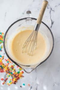 whisking ingredients for pancake recipe