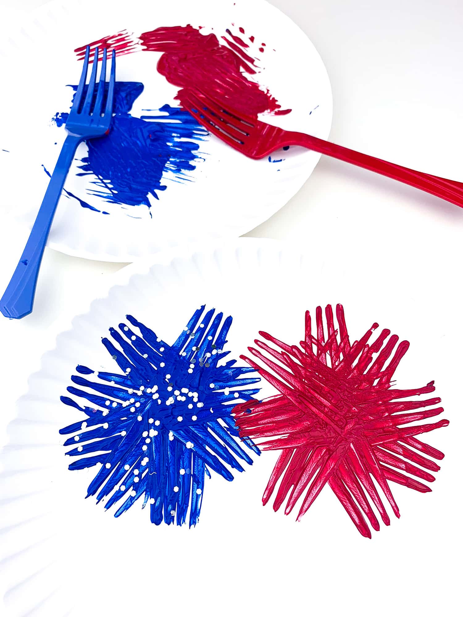 red and blue crafts for kids with painted forks
