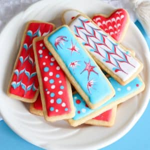 plate of frosted sugar cookies