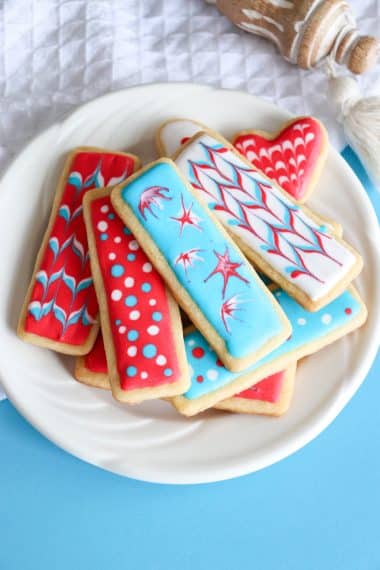 plate of frosted sugar cookies