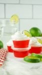red jello shots with limes and whipped cream