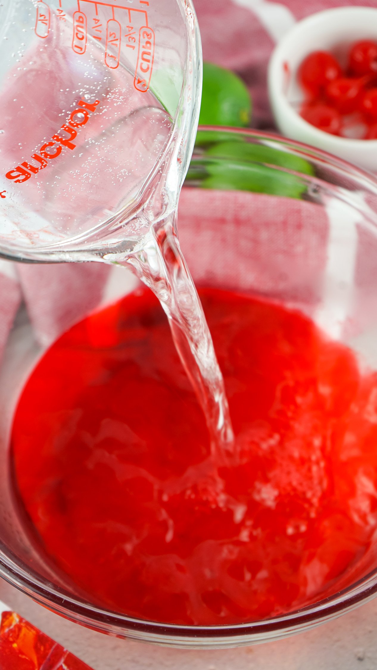 adding mixture to jello shots