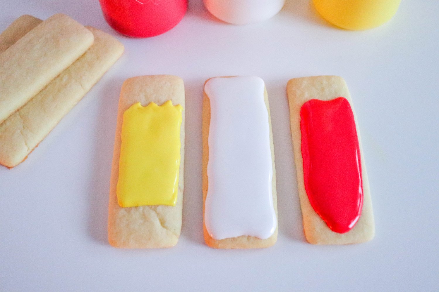 icing spread onto school cookie cut outs