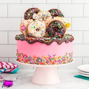 donut topped cake on platter
