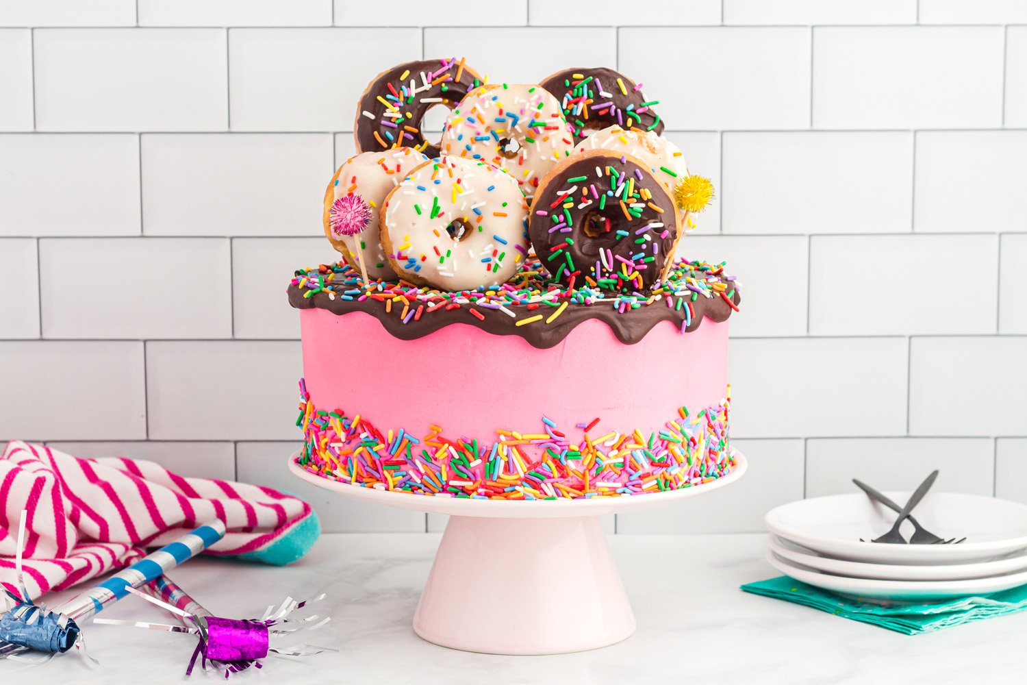 donut topped cake on platter 