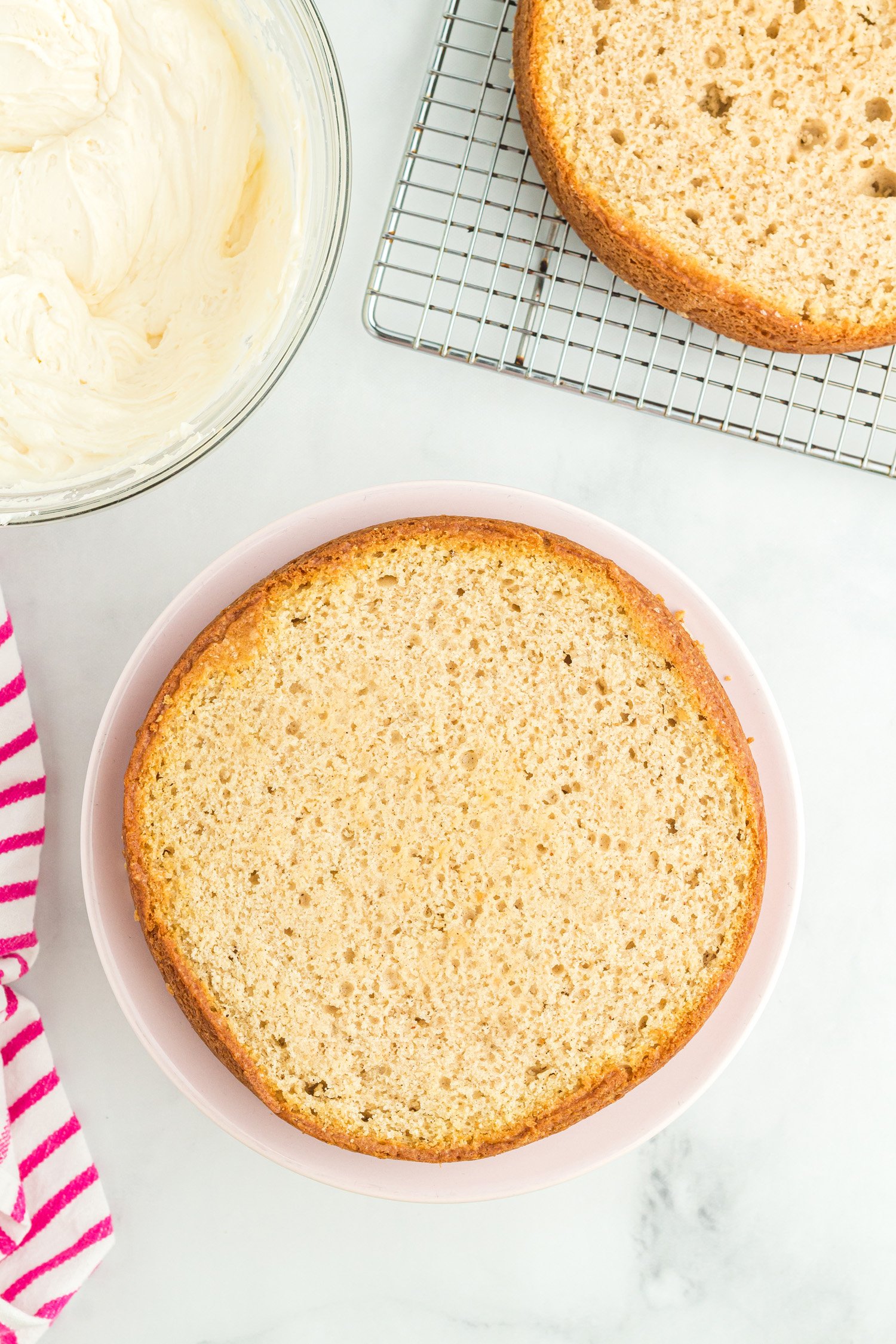 round cake layer prepped on platter