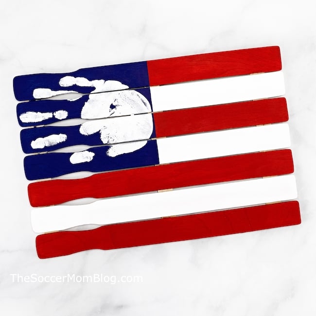 Paint stick red white and blue flag with handprint "stars"