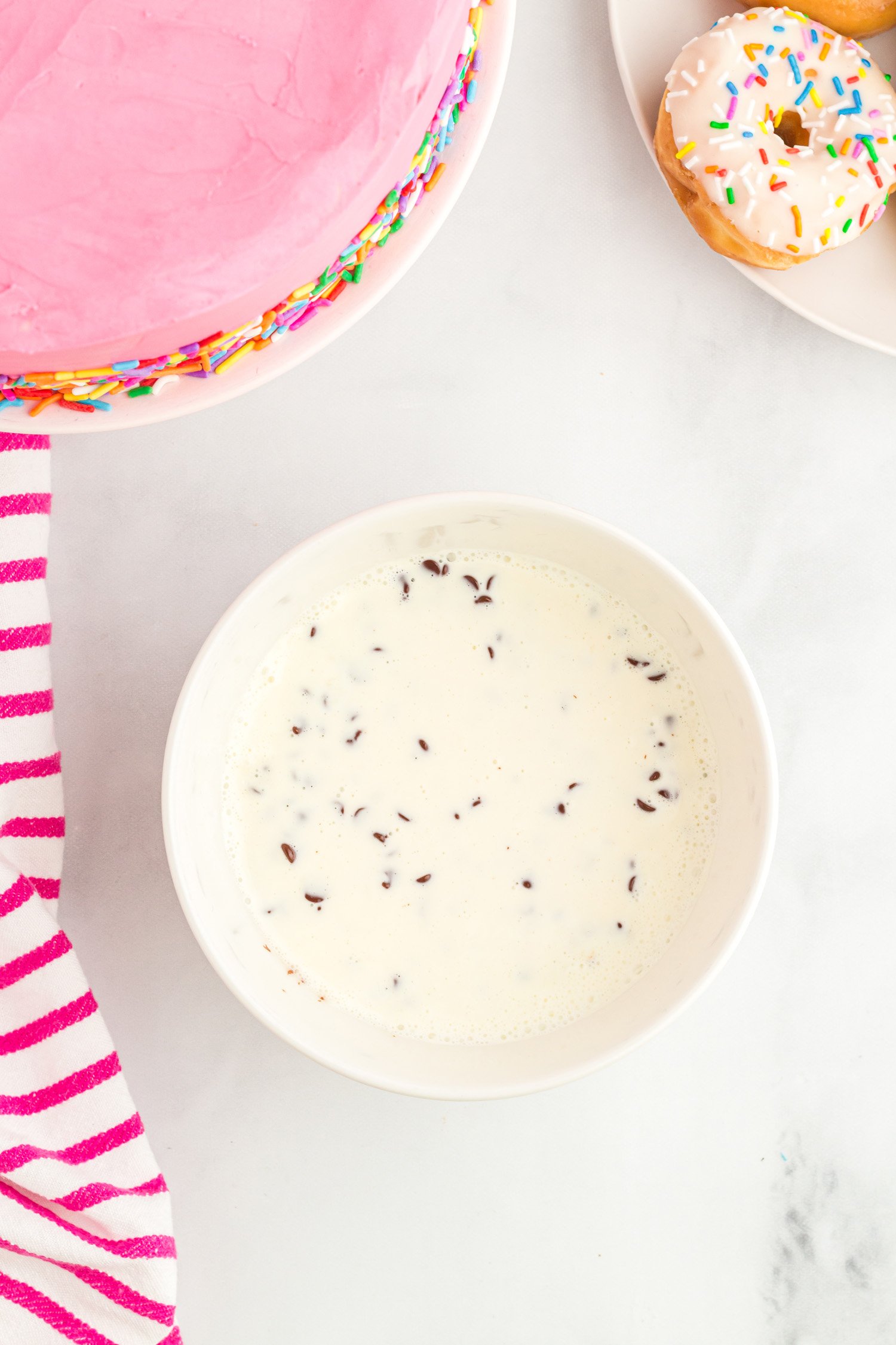 frosting ingredients combined in bowl