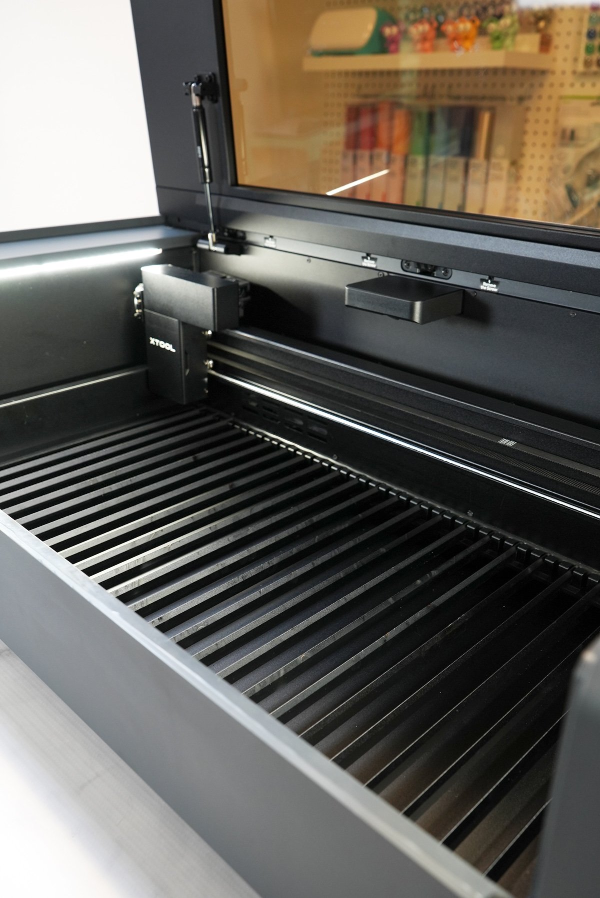 Interior of open xTool P2 Laser Bed with Slats