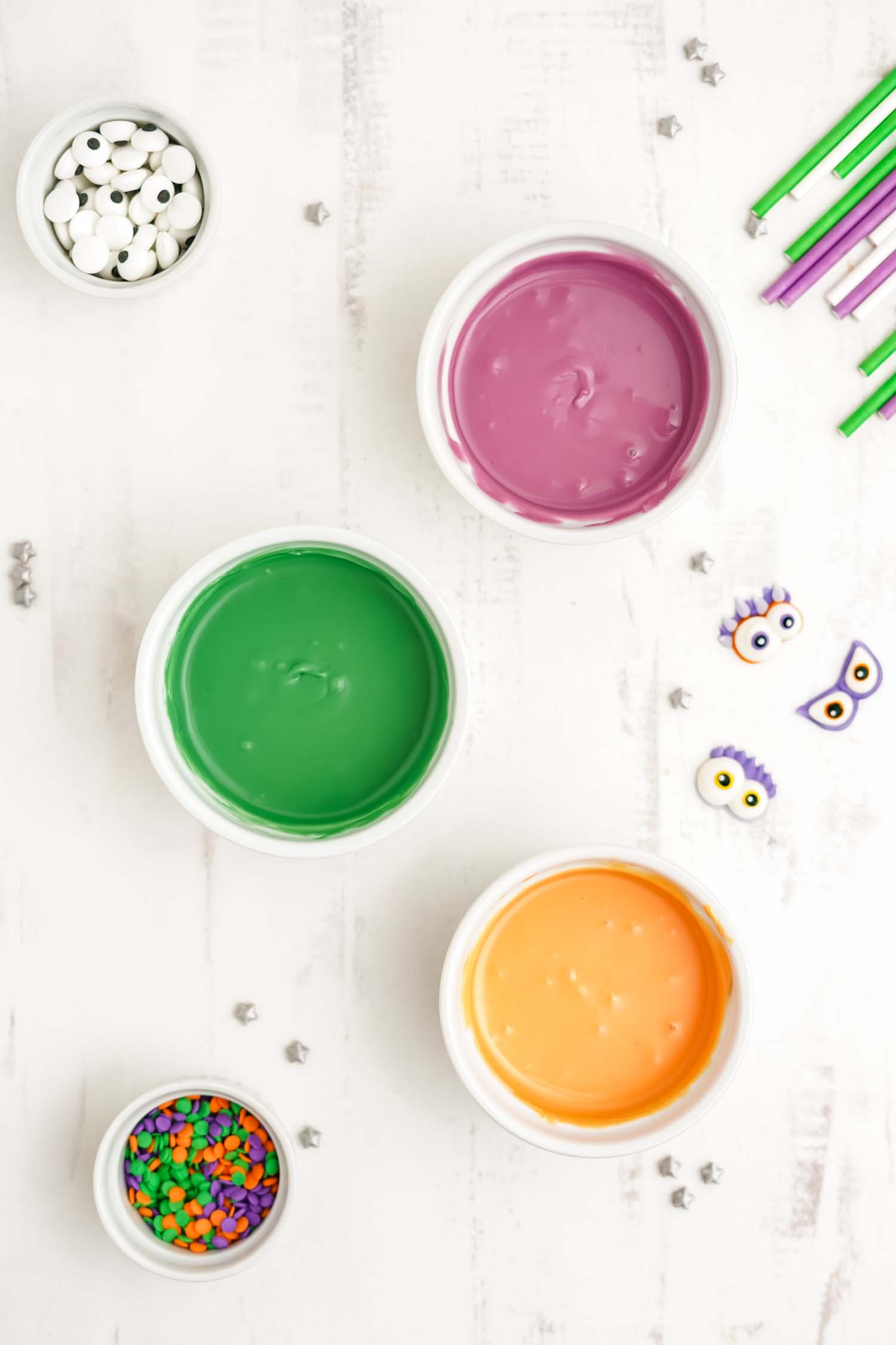 bowls of halloween colored candy melts