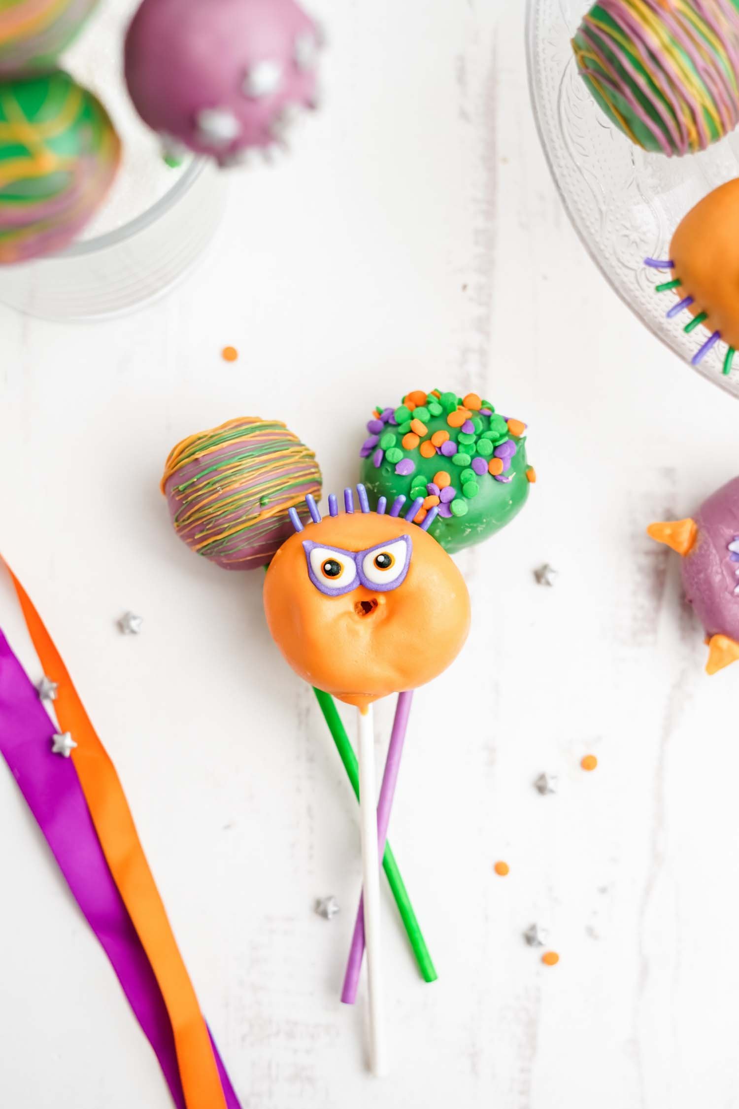candy melt coated cake pops with monster faces