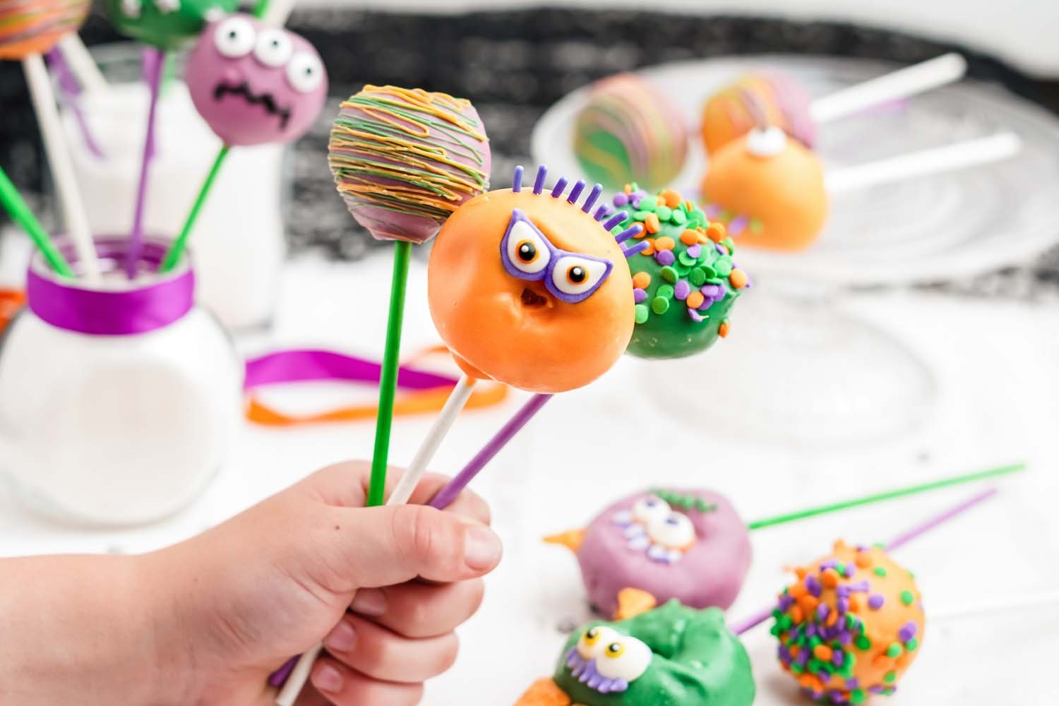 handful of cute halloween cake pops