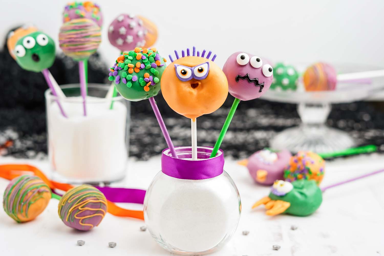 donut hole cake pops made into monster faces for halloween 