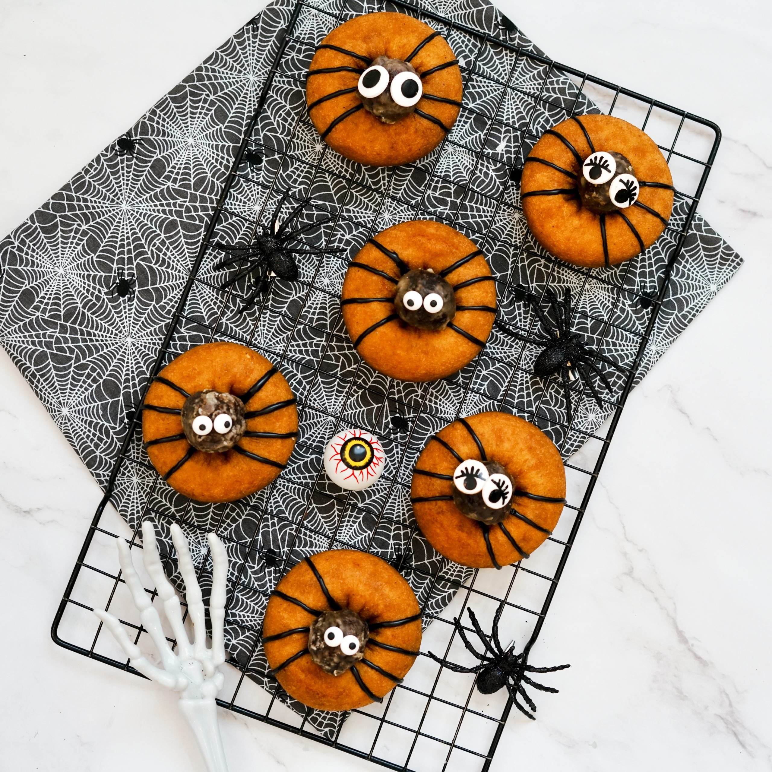 easy halloween donuts on tray with decorations