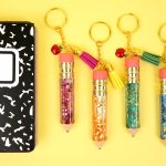 glitter key chains and lined notebook