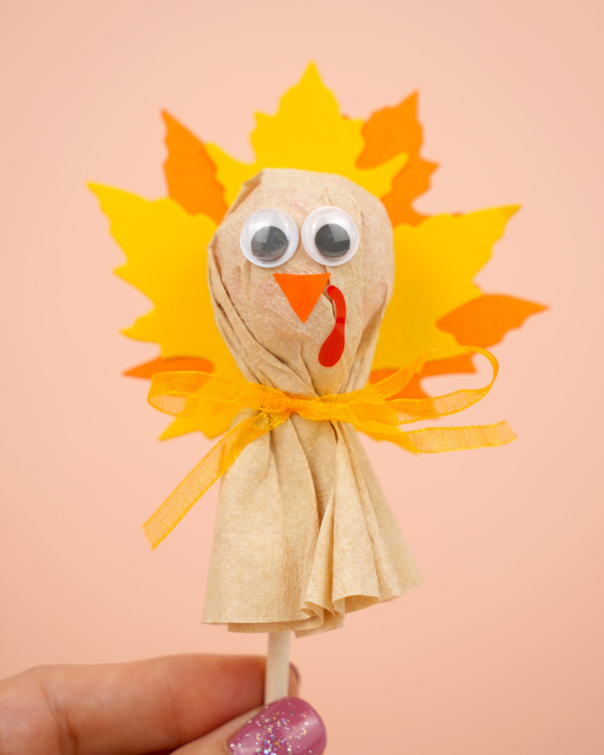 adorable turkey craft project for kids held up