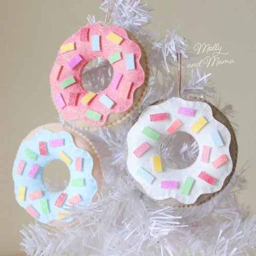 felt donuts ornaments on white christmas tree