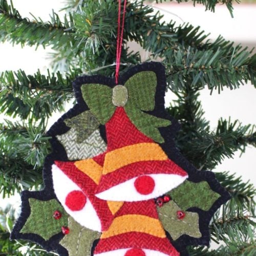 vintage holiday bells ornament on tree
