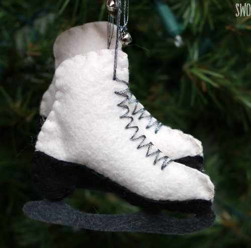 felt ice skate ornaments hanging on tree