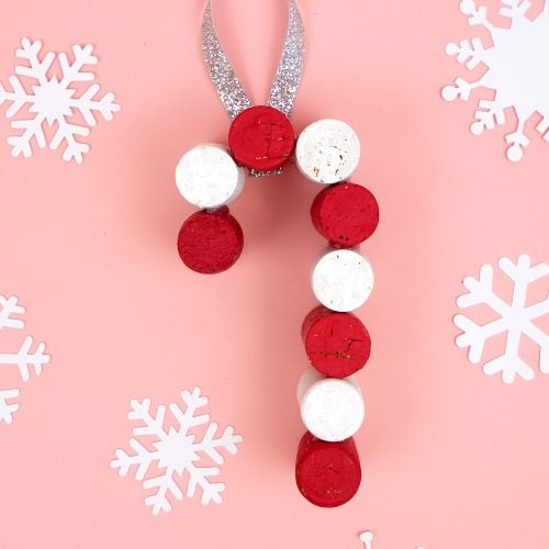 recycled wine cork ornament on winter background